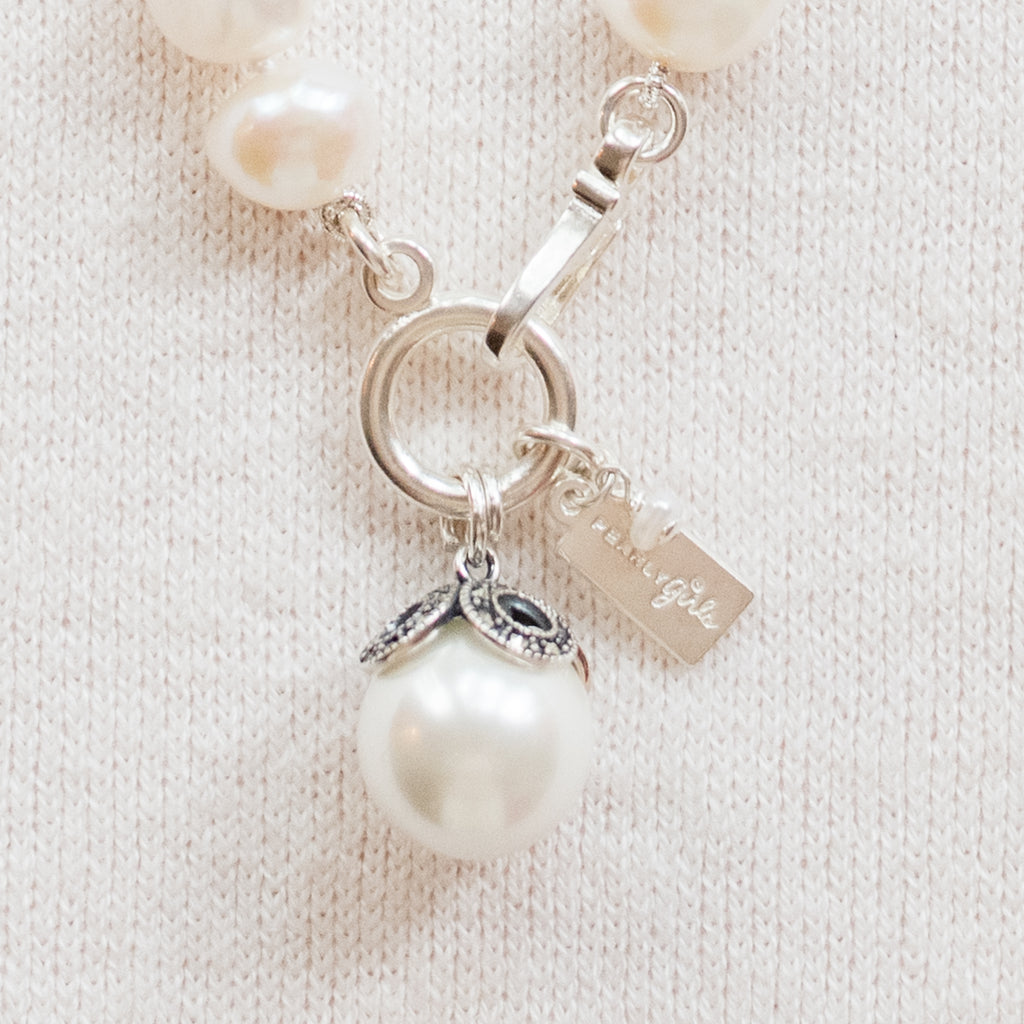 Caroline 18-inch & 21-inch Pearl Necklace, an elegant pearl necklace featuring premium freshwater pearls.