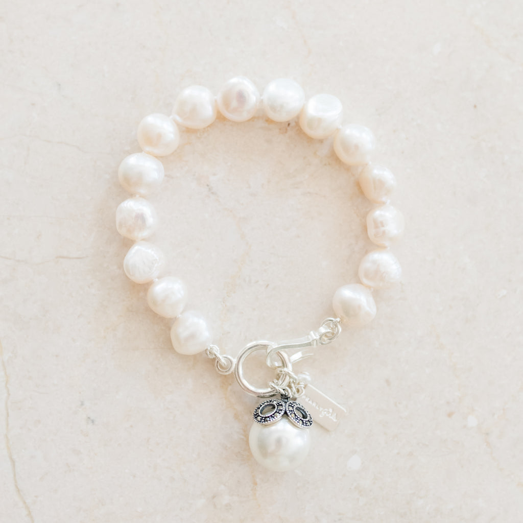 Elegant Caroline Pearl Bracelet with freshwater pearls, epitomizing luxury and grace