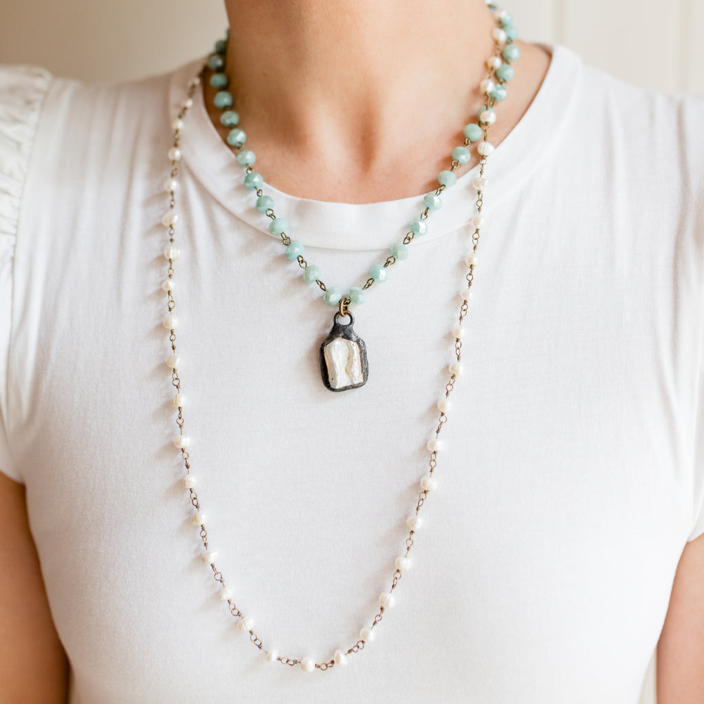 Berkeley Pearl Necklace, a classic, elegant piece with the luster of mother of pearl