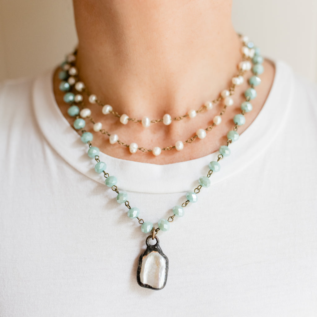 Berkeley Pearl Necklace, a classic, elegant piece with the luster of mother of pearl