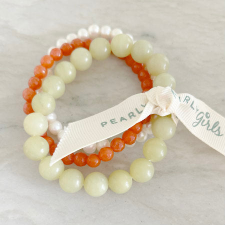Orange Agate and Pearl Bracelet Bundle by Pearly Girls, featuring lemon jade and gold-filled accents. This bundle pairs the warm, earthy tones of orange agate with the classic elegance of pearls, enhanced by the bright touch of lemon jade and the luxury of gold-filled details, creating a vibrant and sophisticated collection.