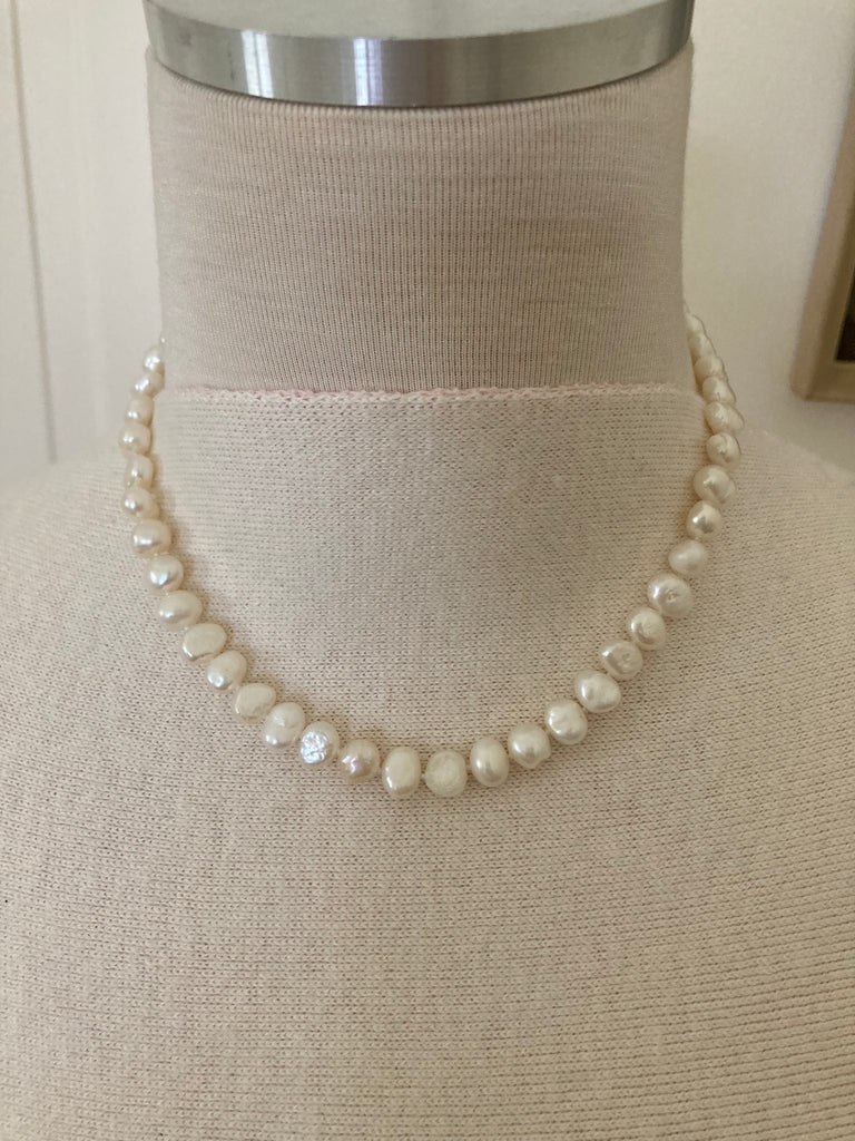 Nugget Pearl Necklace by Pearly Girls, made with freshwater pearls available in versatile lengths. This necklace showcases the unique charm of irregularly shaped nugget pearls, offering a rustic yet elegant look, adaptable to various styles and perfect for different occasions.