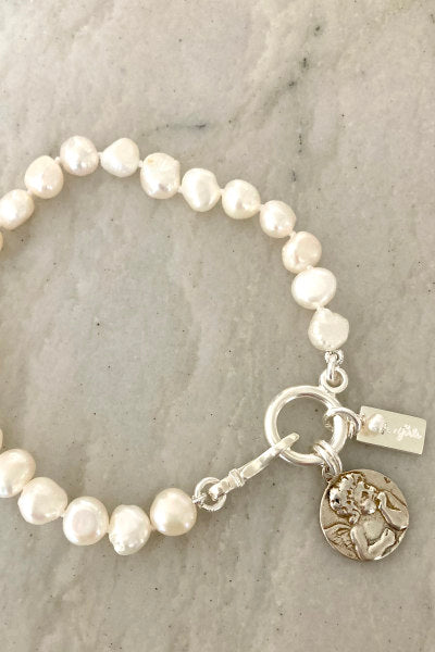 Freshwater pearl bracelet with shop charm